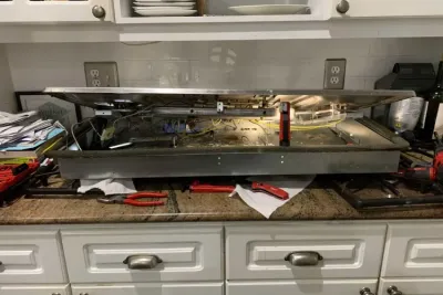ABC Raleigh Appliance Repair technician performing a repair