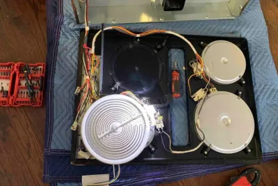 ABC Raleigh Appliance Repair technician performing a repair